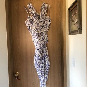 Lilac floral dress with tags still attached.